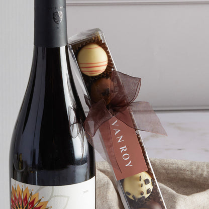 Close up of products in Red Wine & Belgian Chocolates Hamper, a luxury gift hamper from hampers.com UK