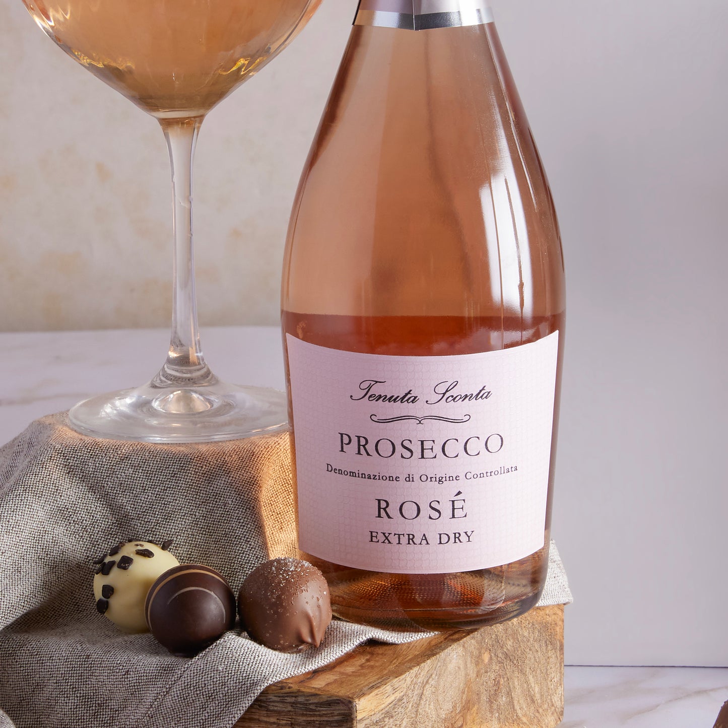 Close up of products in Prosecco Rosé & Belgian Chocolates Hamper, a luxury gift hamper from hampers.com UK