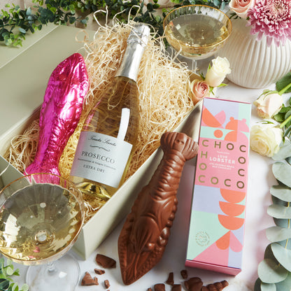 Close up of products in 'You're my Lobster' Prosecco & Chocolates Hamper, a luxury gift hamper from hampers.com UK