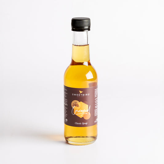 Image of 250ml Caramel Coffee Syrup by Sweetbird, part of luxury gift hampers from hampers.com UK