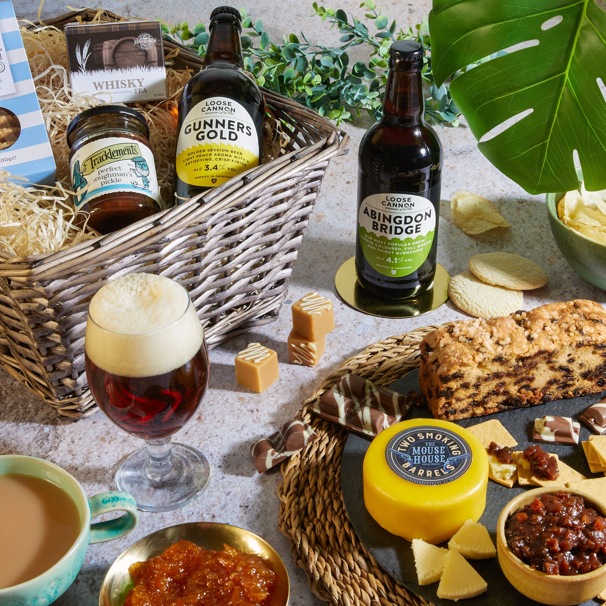 Close up of products in  Gentleman's Tea Beer Hamper for Him, a luxury gift hamper from hampers.com UK