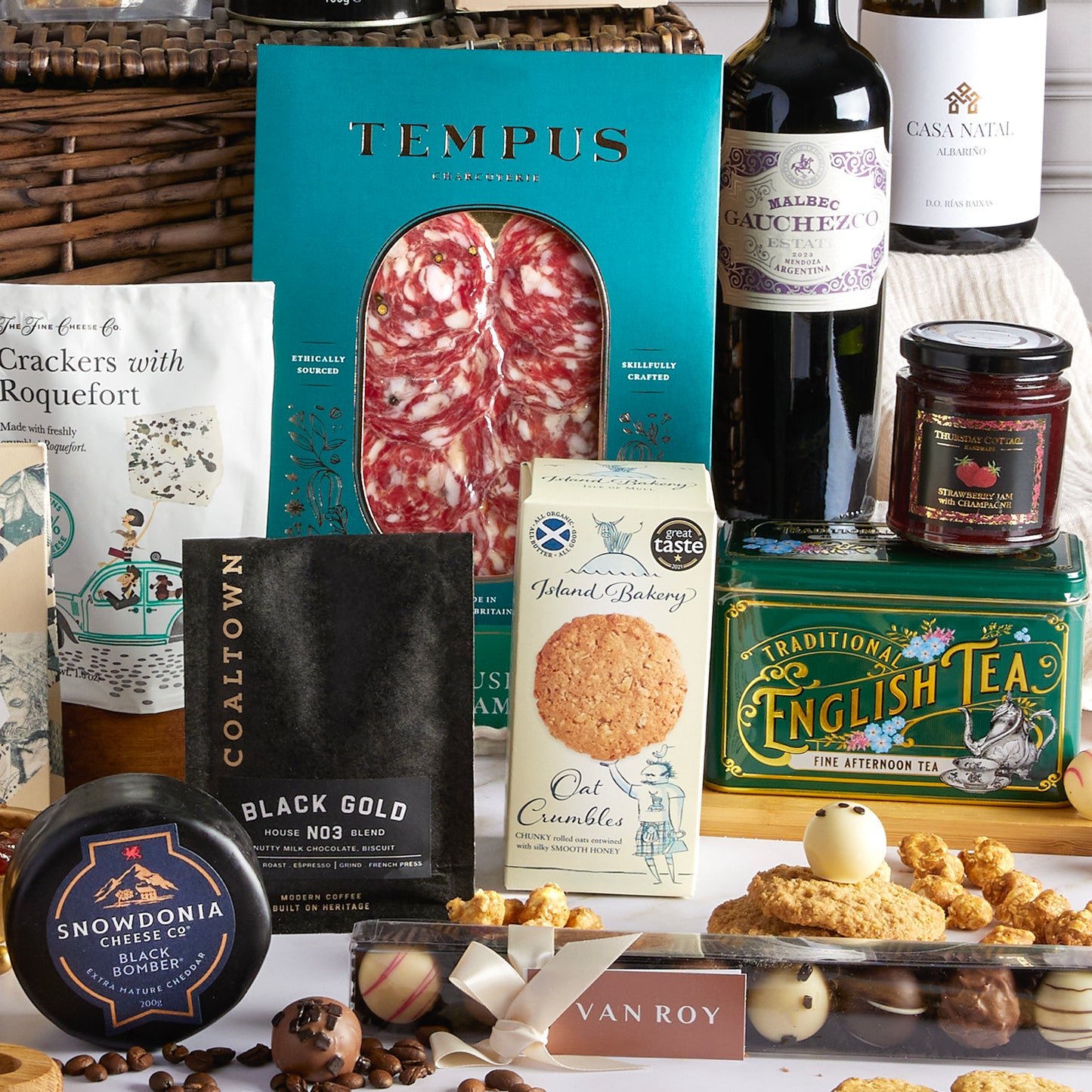 Close up of products in The Deluxe Food & Wine Gift Hamper, a luxury gift hamper from hampers.com