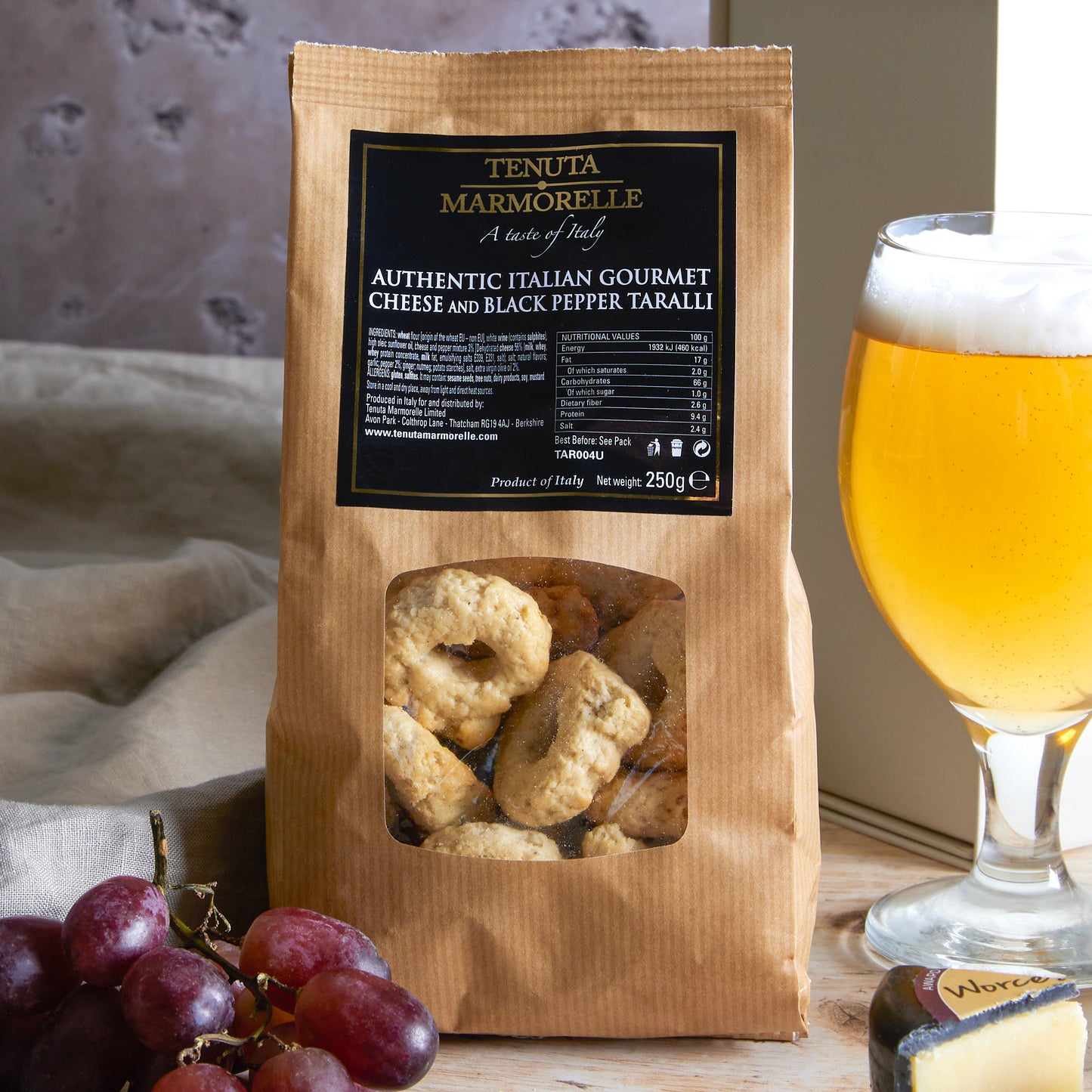 Close up of products in Artisan Cider & Cheese Hamper, a luxury gift hamper from hampers.com UK