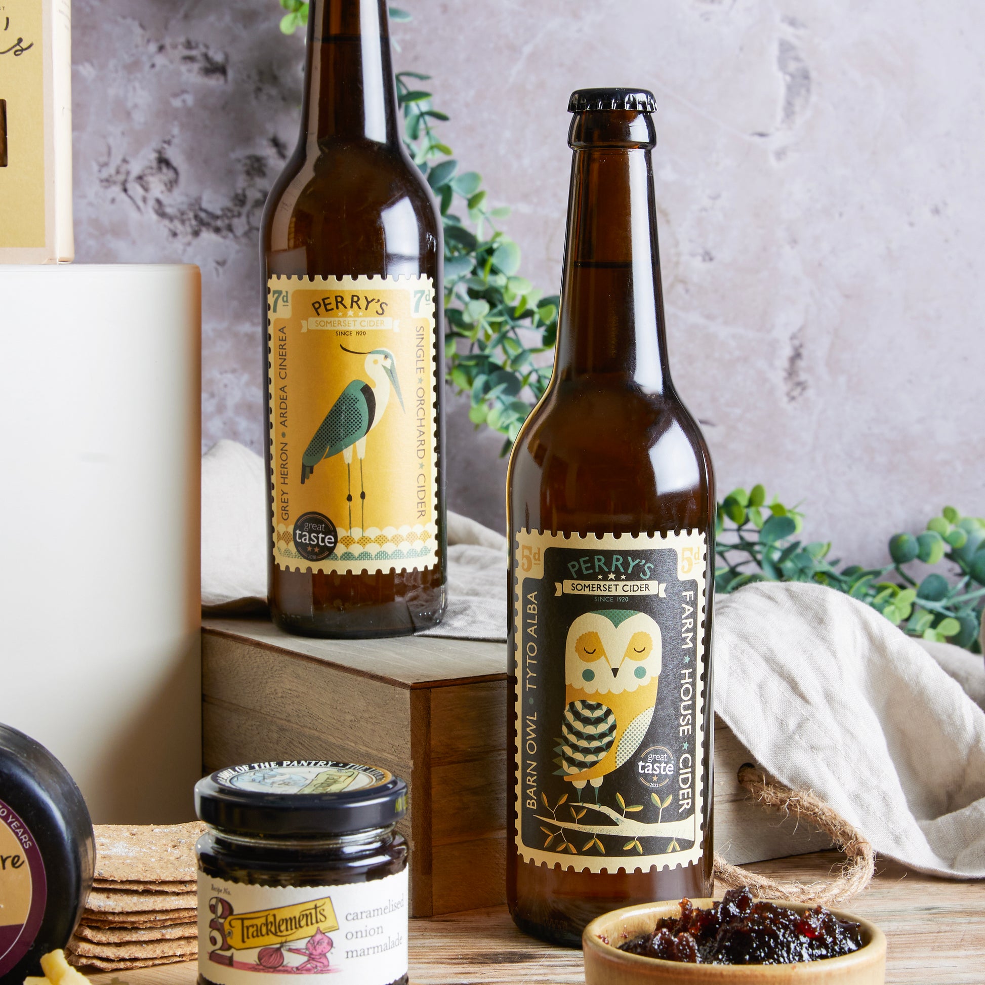 Close up of products in Artisan Cider & Cheese Hamper, a luxury gift hamper from hampers.com UK