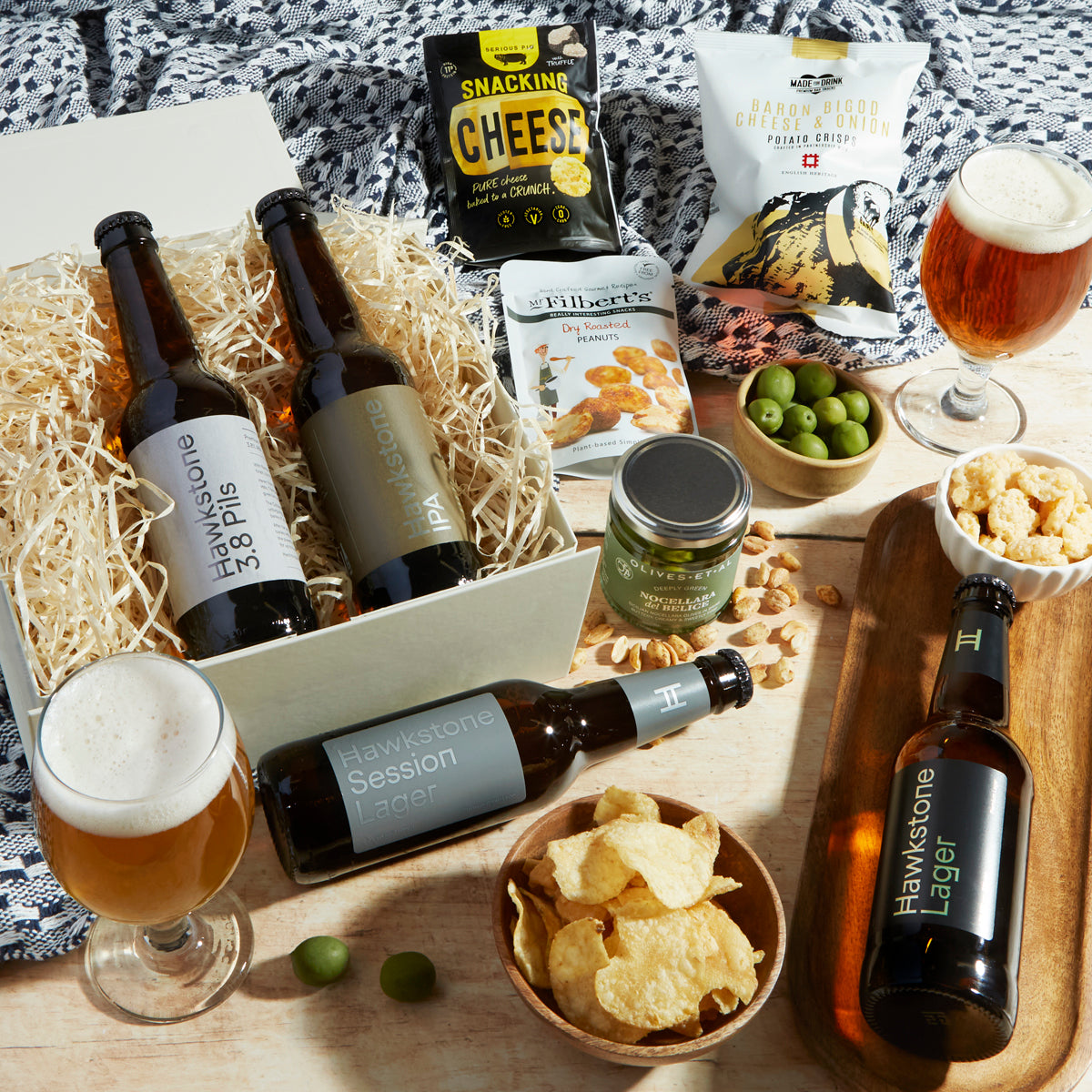 Close up of products in Hawkstone Luxury Beer Hamper, a luxury gift hamper from hampers.com UK