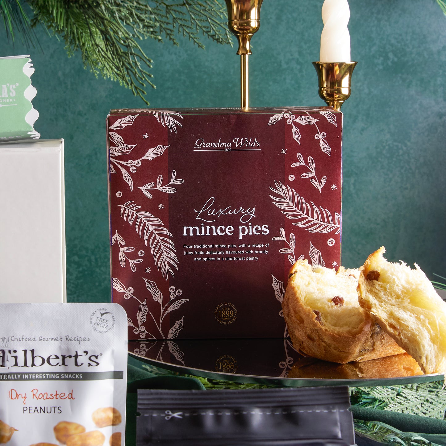 Close up of products in The Christmas Cracker Hamper, a luxury Christmas gift hamper at hampers.com UK