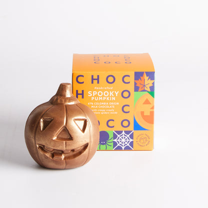 Image of 100g Milk Chocolate Pumpkin with Milk Chocolate Spiders Inside by Chococo, part of luxury gift hampers from hampers.com UK