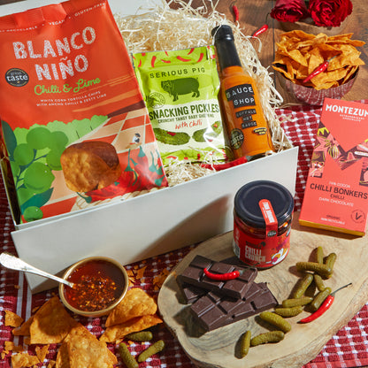 Close up of products in 'Hot Stuff' Chilli Lover's Gift Box, a luxury gift hamper from hampers.com UK