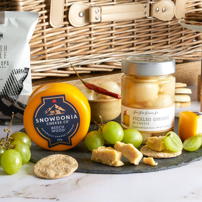 Close up of products in Summer Champagne Picnic Hamper, a luxury gift hamper from hampers.com