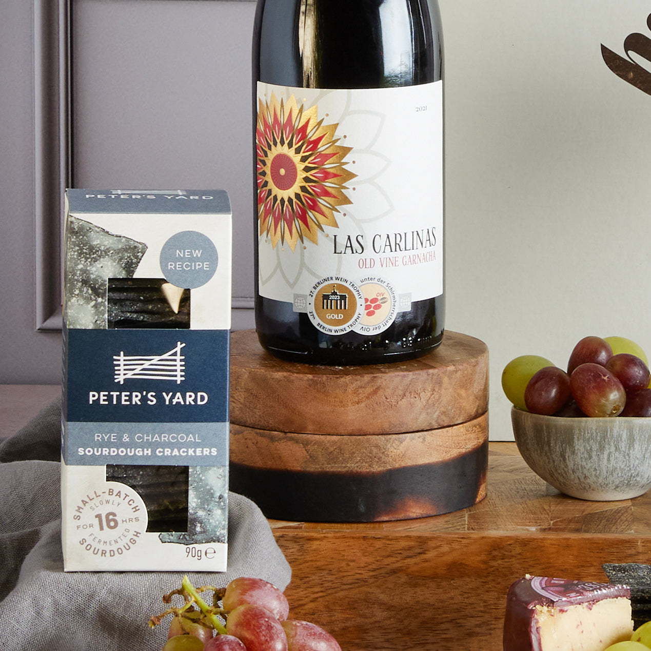 Close up of products in Classic Wine & Cheese Gift Box, a luxury gift hamper from hampers.com UK