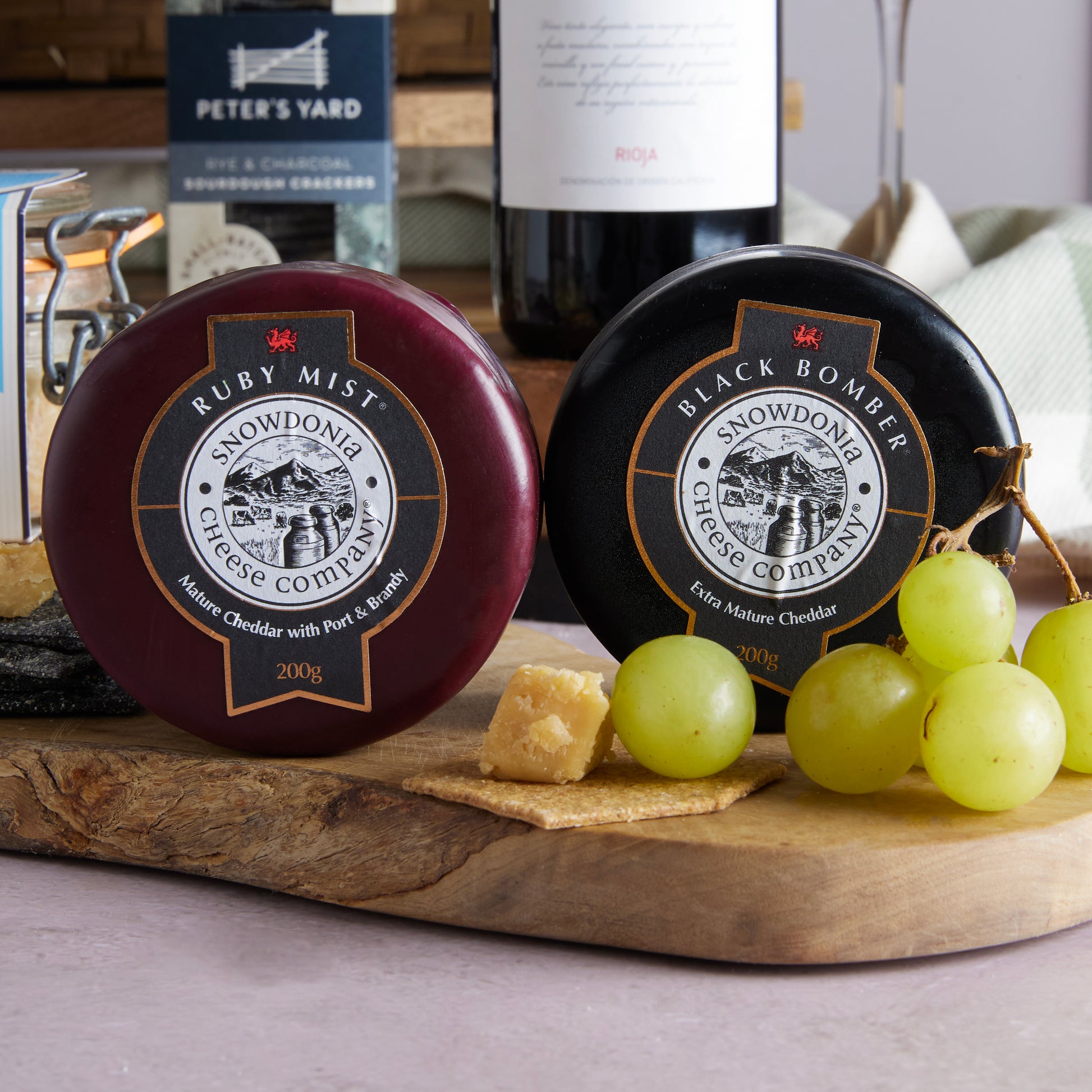 Close up of products in Wine, Cheese & Rillette Hamper, a luxury gift hamper from hampers.com UK