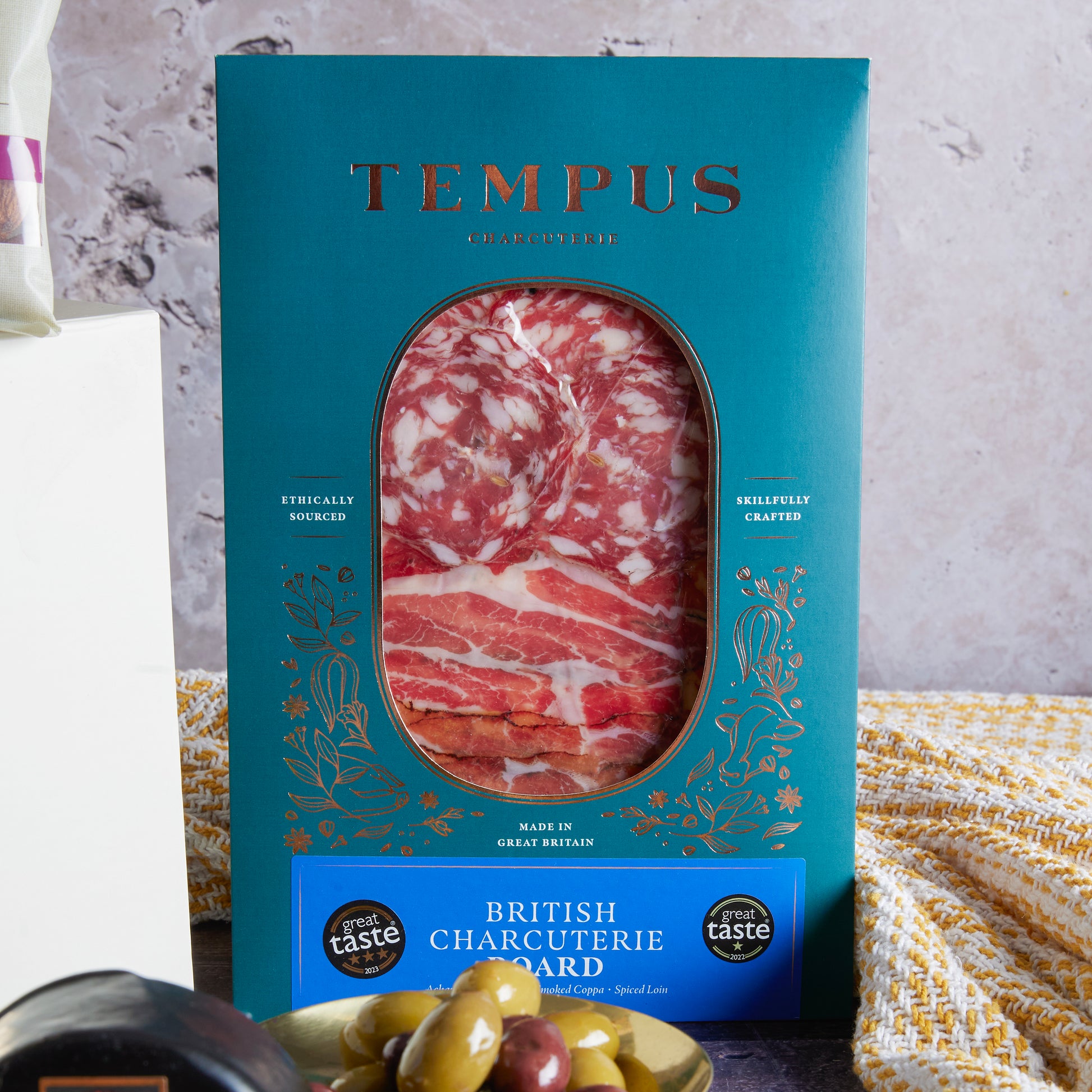 Close up of products in The British Charcuterie Tasting Hamper, a luxury gift hamper from hampers.com UK