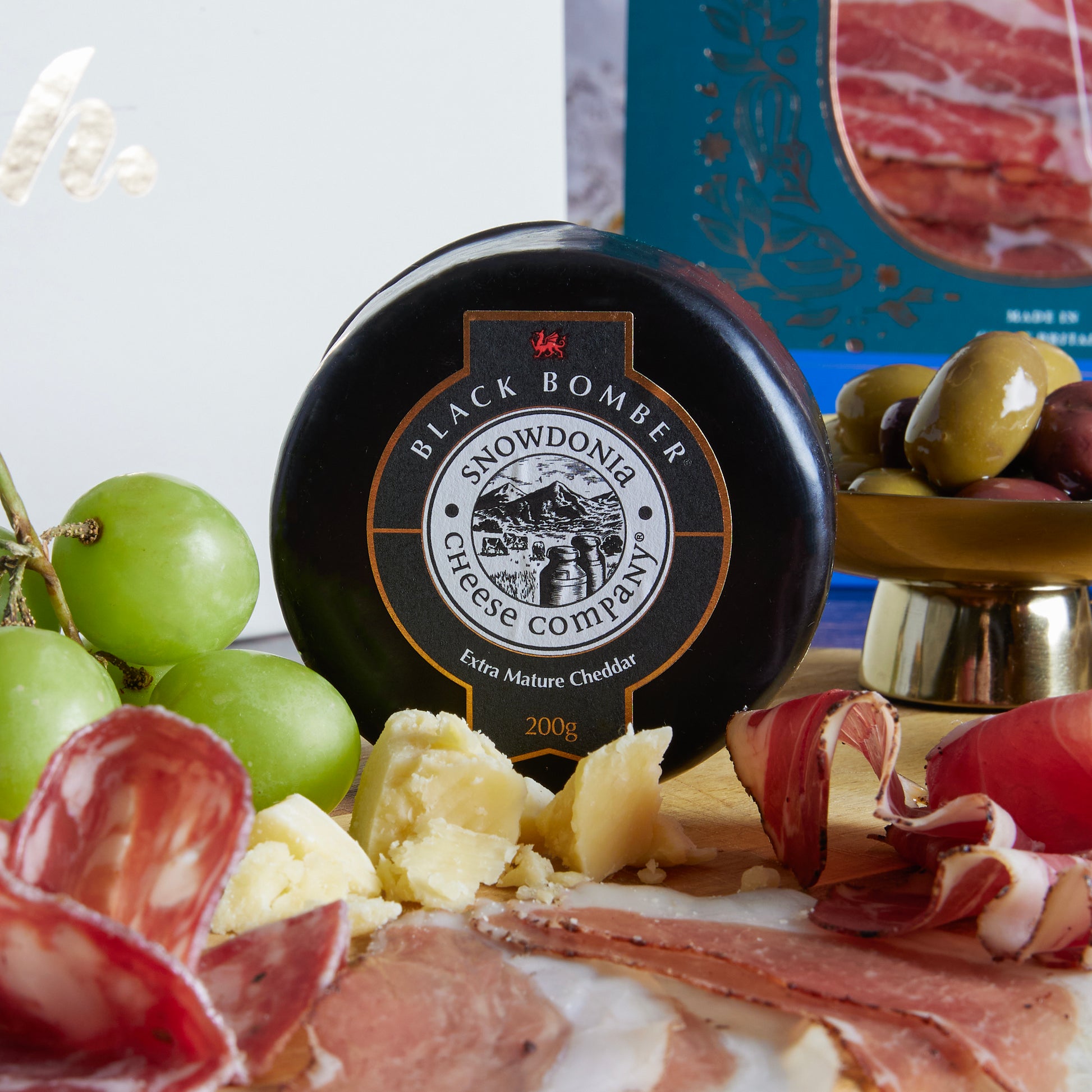 Close up of products in The British Charcuterie Tasting Hamper, a luxury gift hamper from hampers.com UK