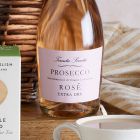 Close up of products in Prosecco Rosé Indulgence Hamper, a luxury gift hamper from hampers.com UK