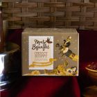 Close up of produts in the Festive Afternoon Tea Hamper, a luxury Christmas gift hamper at hampers.com UK