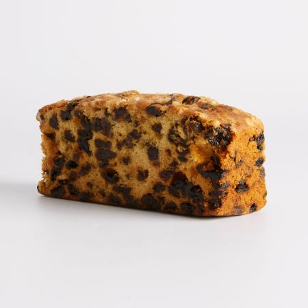 Image of Farmhouse Sultana Loaf Cake Topped with Sugar Nibs by Maxwell & Franks, part of luxury gift hampers from hampers.com UK