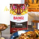 Close up of products in The Curry Night Indian Beer Hamper, a luxury gift hamper from hampers.com UK