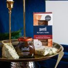 Close up of products in The Port & Stilton Christmas Gift Box, a luxury Christmas gift hamper at hampers.com UK