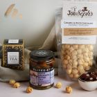 Close up of products in Sweet & Savoury Delights With Prosecco, a luxury gift hamper at hampers.com