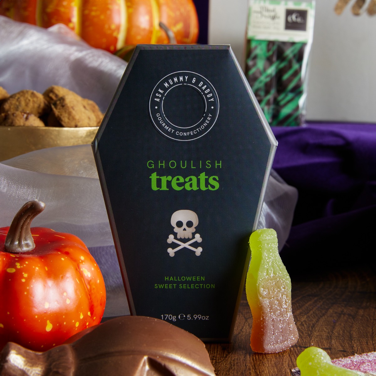 Close up of ghoulish treats - coffin shaped box of sweets