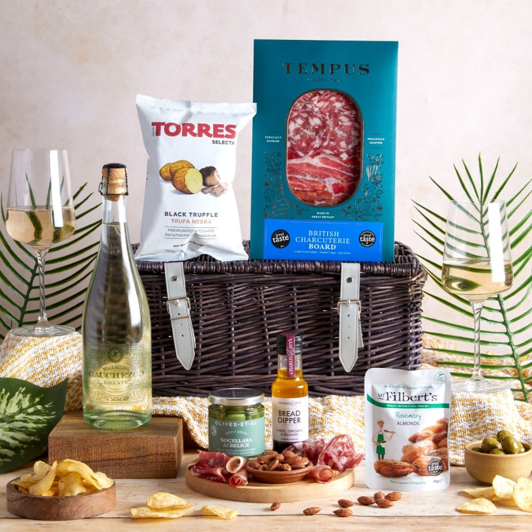 The Charcuterie & Fizz Hamper with contents on display